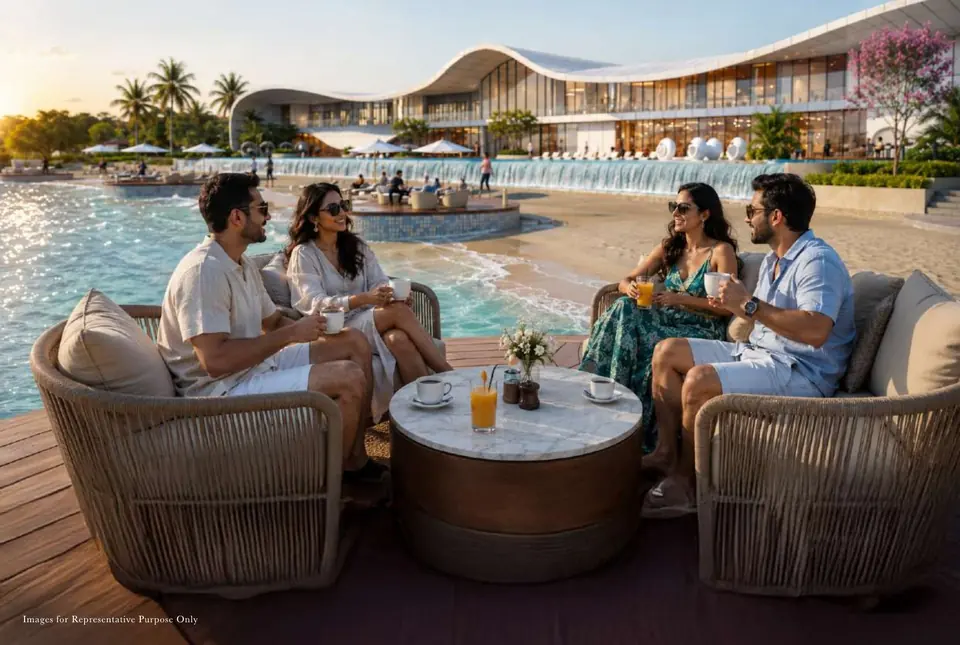 Residents relaxing on the clubhouse deck beside the lagoon
